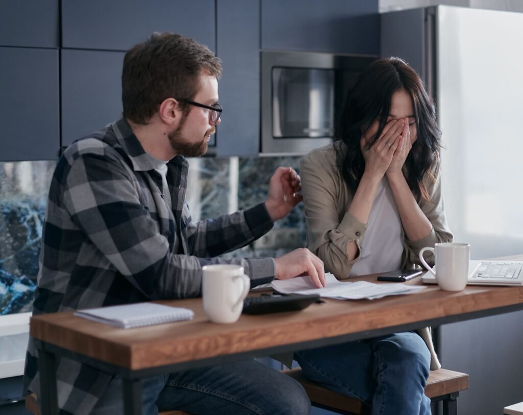 Former student reviewing private student loan payments